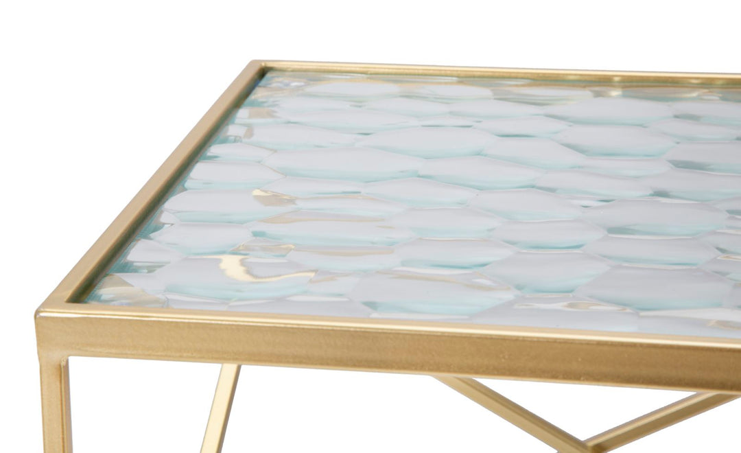 Glam borde i guldfarve, jern og glas