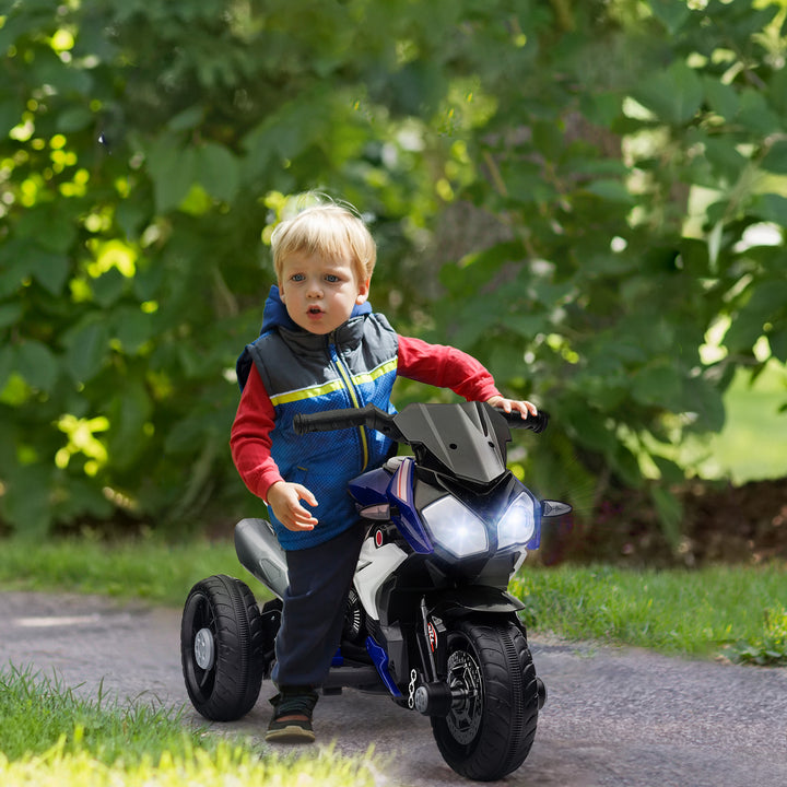 Elektrisk børnemotorcykel, lys og lyd, 3 km/t, genopladelig, plast og metal, blå/hvid