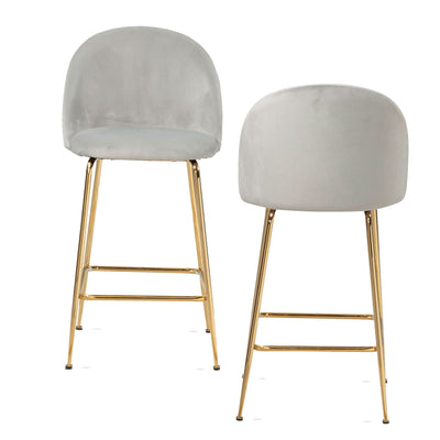 Skab et stilfuldt rum med disse moderne barstole i grå fløjl og guldben!