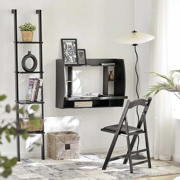 Udnyt pladsen optimalt med dette pladsbesparende skrivebord i sort (B64 x D58 x H82 cm)