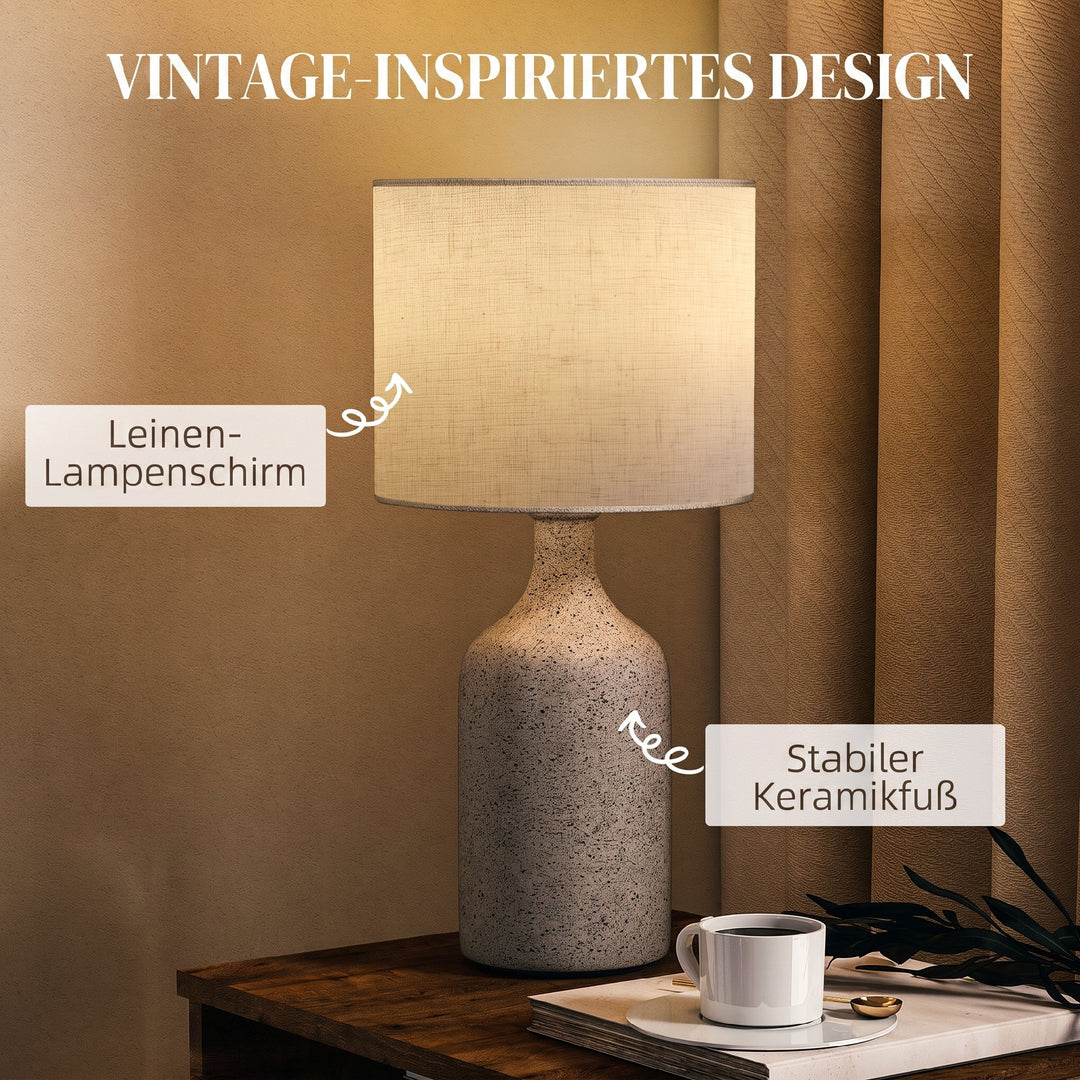 Vintage bordlampe med keramisk fod, sand og beige.