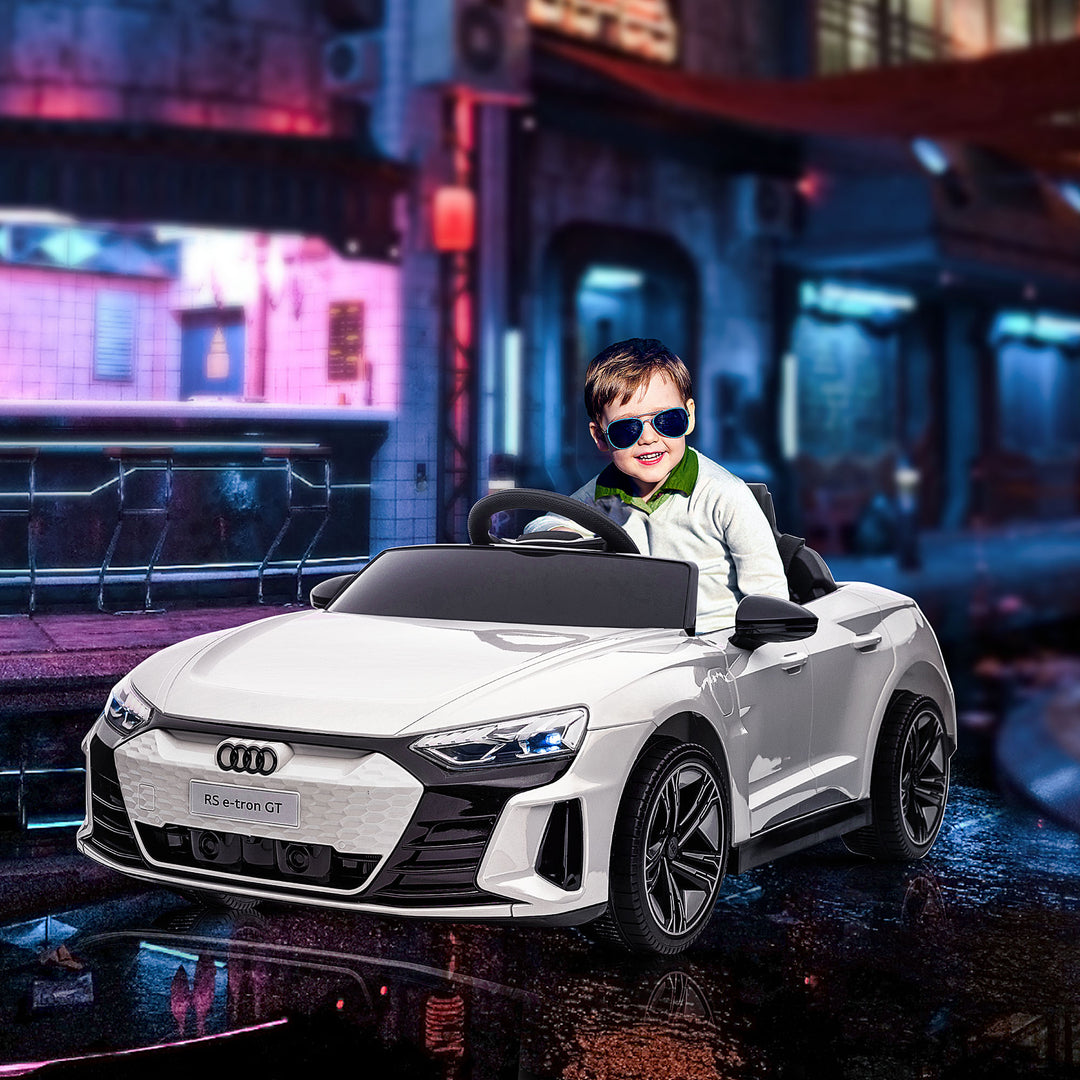Audi RS e-tron GT elbil til børn med sikkerhedssele, fjernbetjening, forlygter, musikfunktion, hvid, 103 x 58 x 41 cm