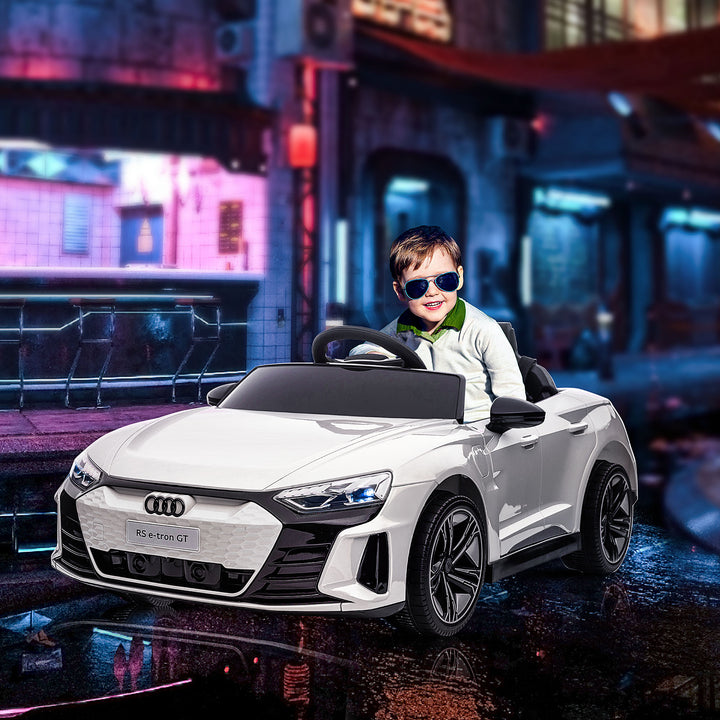 Audi RS e-tron GT elbil til børn med sikkerhedssele, fjernbetjening, forlygter, musikfunktion, hvid, 103 x 58 x 41 cm