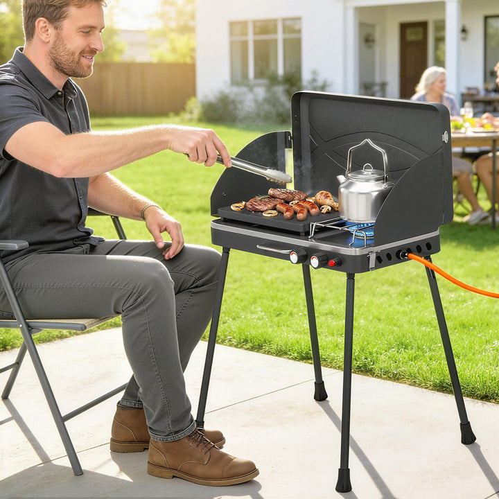 Bærbar gasgrill, 2 brændere, 7 kW, 2-i-1 bordgrill med stegefunktion, foldbare ben, grillrist, vindskærm, låg og låsemekanisme.