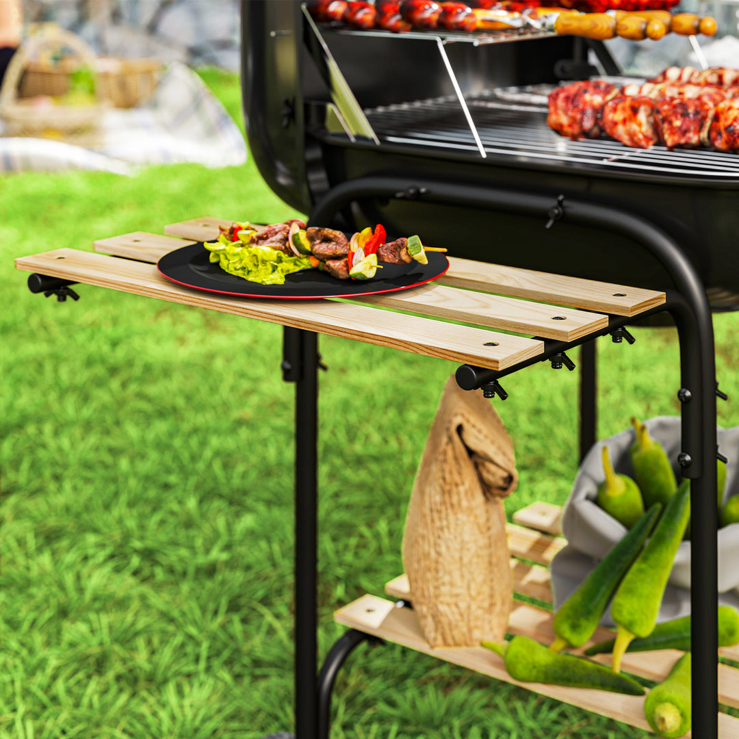 Kulgrill af stål, grillvogn med aflåseligt låg, grillrist, hjul, håndtag, træhylde, 98 x 54 x 91 cm, sort