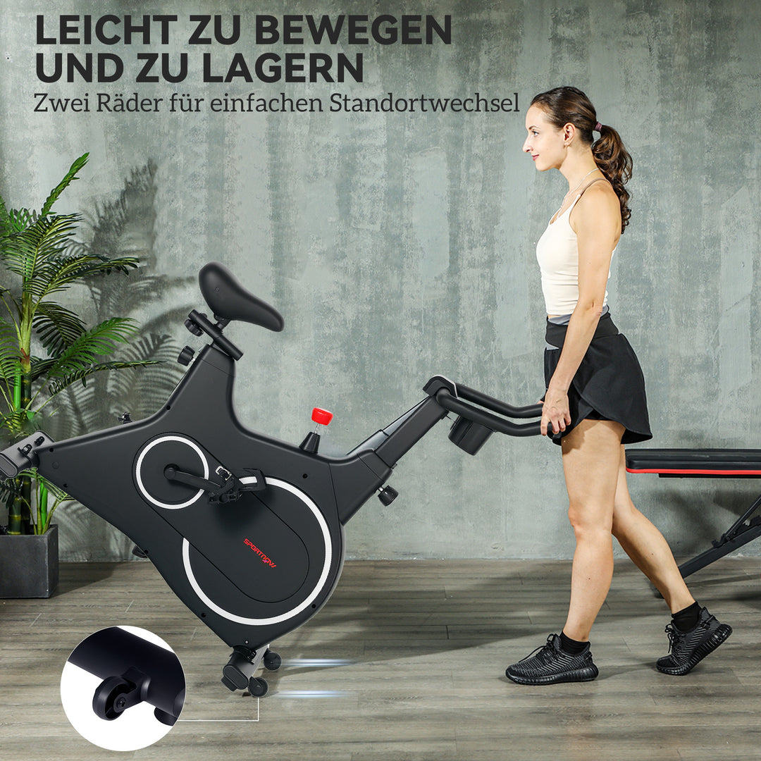 Motionscykel, fitnesscykel med lcd-skærm, tabletholder, flaskeholder, komfortabelt sæde, kompakt, sort