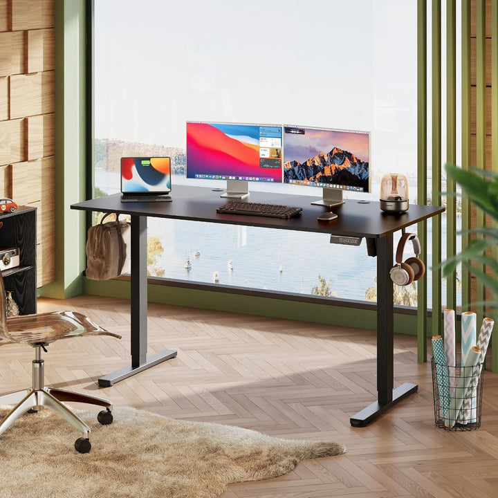 DEVAISE højdejusterbart skrivebord 140×70 cm, bordplade i ét stykke, støjsvag motor med 3 højdehukommelsesindstillinger, ergonomisk hæve-sænke skrivebord til kontoret, sort