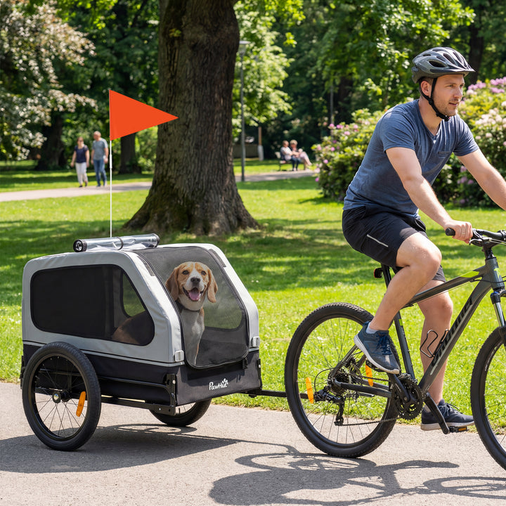 Sammenklappelig cykeltrailer til mellemstore hunde op til 20 kg med nedklappelig rampe, reflekser, snor, flag, grå.