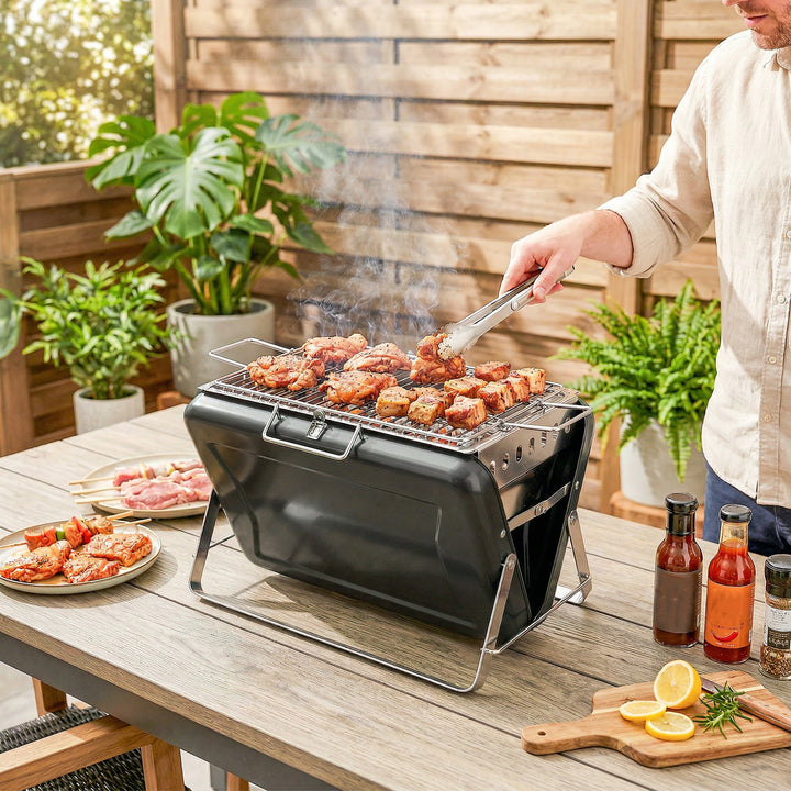 Rustfrit stål kulgrill BBQ-ryger med grillrist, håndtag og sammenklappelige ben til grill og camping, 40x28x25,5 cm, sort