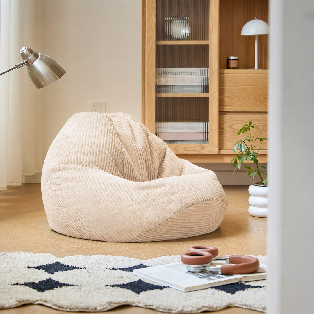 FLOBY Beige fløjlsbøjlepuf til stuen