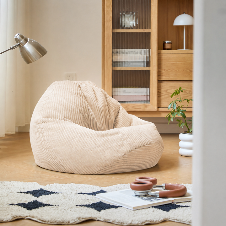 FLOBY Beige fløjlsbøjlepuf til stuen