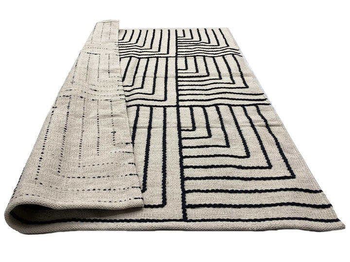 KEVO Rektangulært bomuldstæppe med sorte og beige mønstre 180 x 120 cm