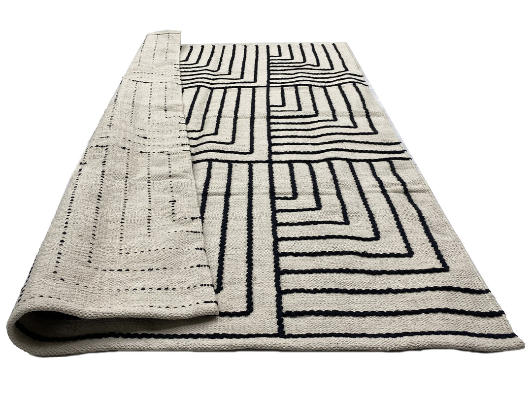 KEVO Rektangulært bomuldstæppe med sorte og beige mønstre 90 x 60 cm