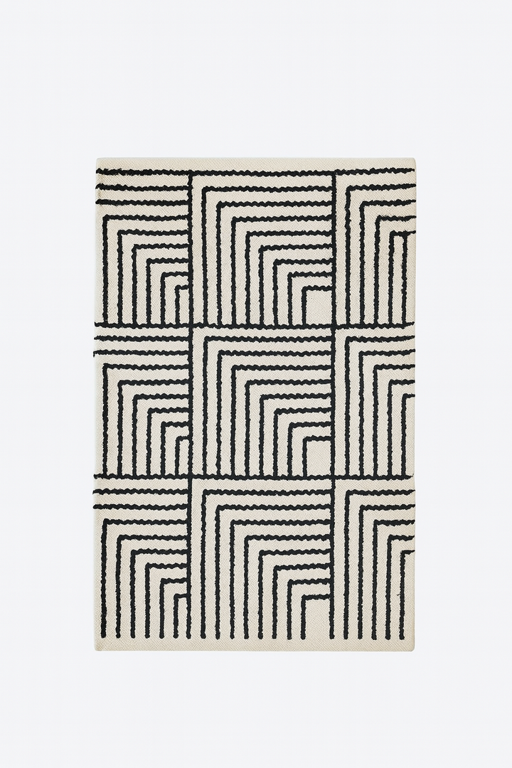 KEVO Rektangulært bomuldstæppe med sorte og beige mønstre 90 x 60 cm