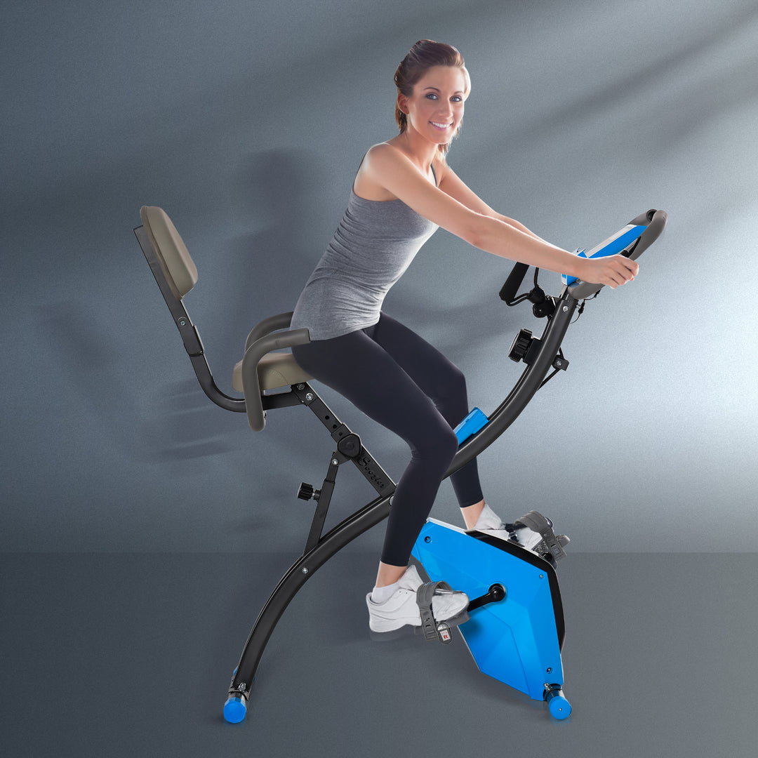 2-i-1 motionscykel med LCD-display, justerbar pulsmåler, sæde og hjul; foldbar motionscykel med 8 niveauer af magnetisk modstand, spændekabel og stålstel.