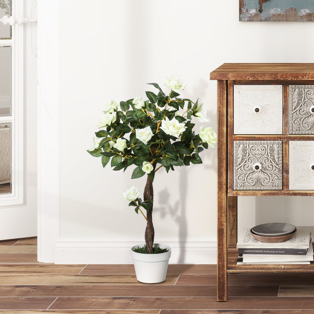 Kunstigt træ i solen, kunstig plante i cementpotte, kunstig plante