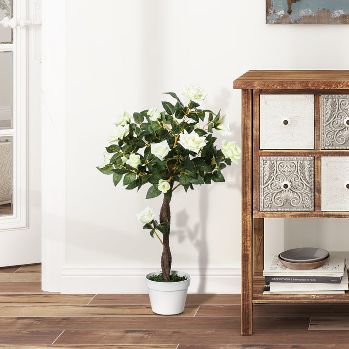 Kunstigt træ i solen, kunstig plante i cementpotte, kunstig plante