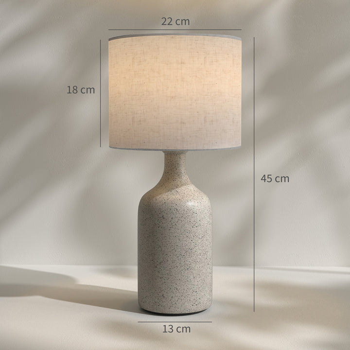 Vintage bordlampe med keramisk fod, sand og beige.