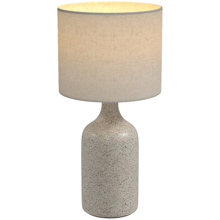 Vintage bordlampe med keramisk fod, sand og beige.